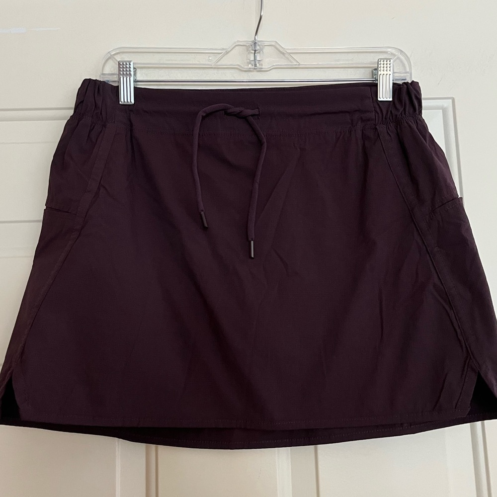 Women’s Te Verde dark purple active tennis pickleball skirt with pockets.Medium